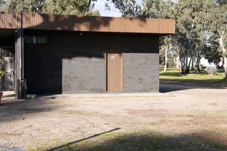 A practical and accessible ensuite featuring classic tiling and essential amenities—simple and functional for everyday use. One of the Cabins, Dwellings, Caravans, & Glamping Tents at Stawell Grampians Gate C&C Park.
