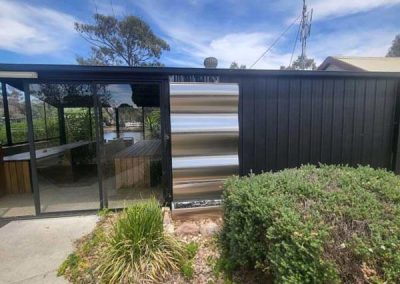 This modern water feature adds a touch of tranquility and style to the communal kitchen area at Stawell Grampians Gate C&C Park. One of the Cabins, Dwellings, Caravans, & Glamping Tents at Stawell Grampians Gate C&C Park.