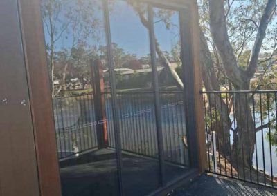 Modern workspace pod exterior with large windows and sunlit surroundings in Stawell Grampians Gate C&C Park.